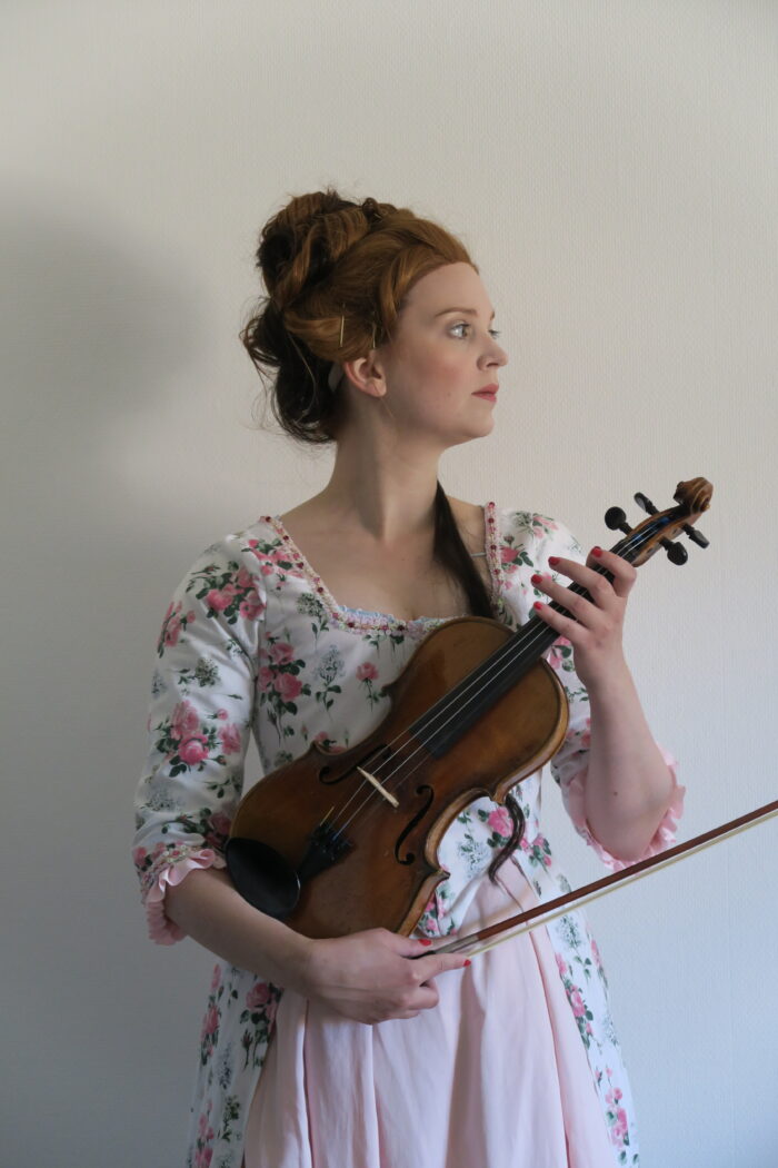 my violin and me wearing my new 18th century dress